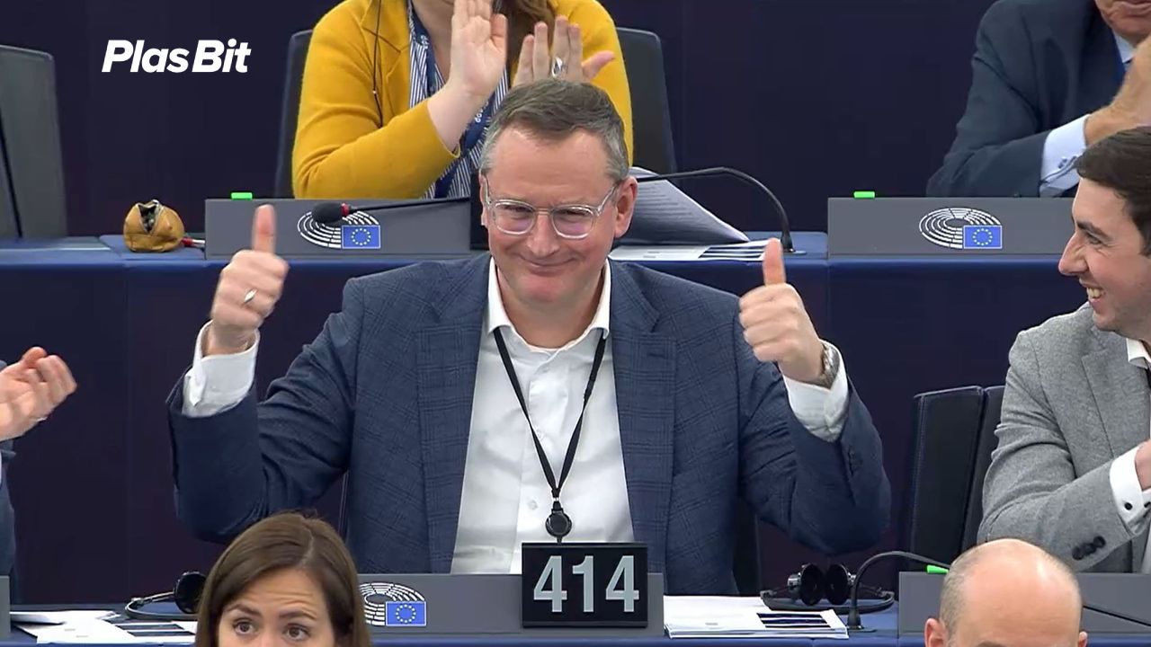 The image shows Stefan Berger, a German politician in the EU Parliament, beaming with joy and showing two thumbs up after he voted for the adoption of a law that made unregulated crypto "jetzt verboten."